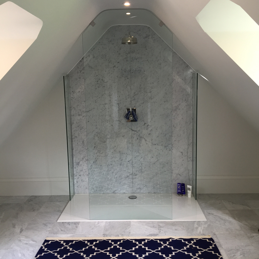 Bespoke marble shower with marble flooring and walls